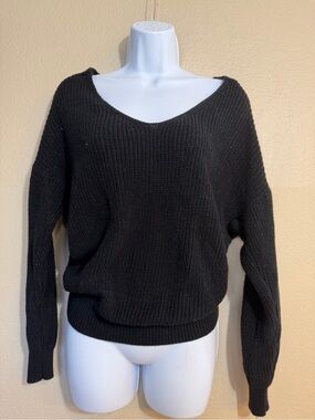 Love Tree sparkly Black ribbed knit sweater with twist open back.